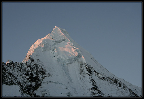 Artesonraju sunset by escher is still alive, Alpenglow on the summit of Artesonraju (6025m) Cordillera Blanca, Peruvian Andes.2005 peru expeditio