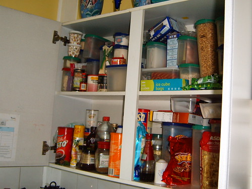 springcleaning the kitchen before - food cupboard | by roobarbs