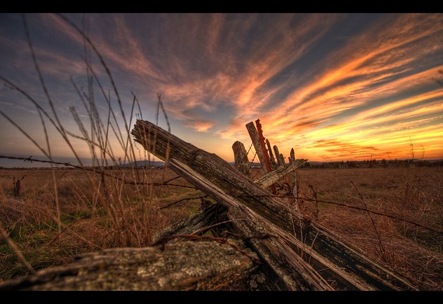 Sunset above rural decay