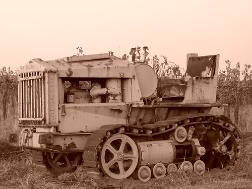 Cletrac_Sepia by Mike Zuk, Sunset in the Cleatrac graveyard. Checking out the settings on my camera.sunset white black graveyar