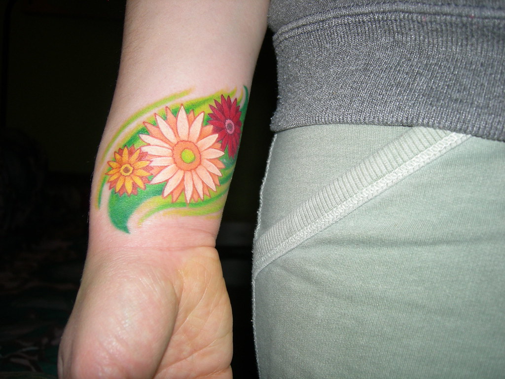 gerbera daisies tattoo.