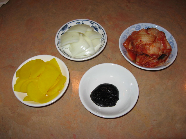 Sam Won Gahk: Condiments - pickled radish, onions, kim chee, black bean sauce