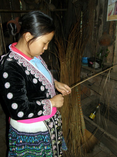 Hmong tribe member weaving hemp