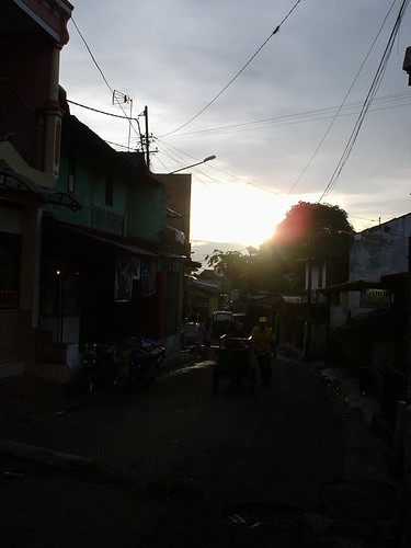 street sky sun sunrise dark dawn wire motorcycle cart dago