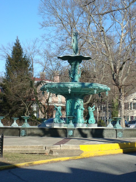 Broadway Fountain in Madison, Indiana. The fountain, originally cast iron, was presented in 1876 to the Philadelphia Centennial Exposition by the Republic of France. It was later purchased by the Indiana Order of Odd Fellows and presented to the city of Madison, Indiana. It was returned to its original condition--but recast in bronze--during the latter 1970's and re-dedicated in the summer of 1980.