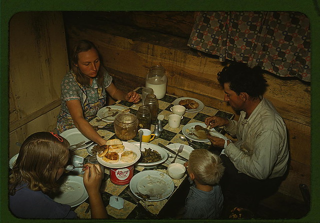 The Faro Caudill [family] eating dinner in their dugout, Pie Town, New Mexico  (LOC)