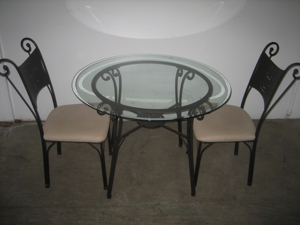 Patio Set - $50 | Comes with four chairs, sturdy base and th… | Flickr