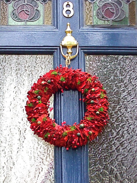 Christmas traditions - red floral wreath