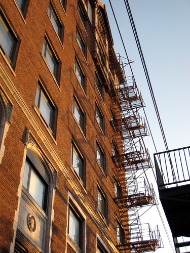 SD, Rapid City Evening by HeroJH, windows light sunset sky reflection building brick architecture southdakota shadows stairwell powerl