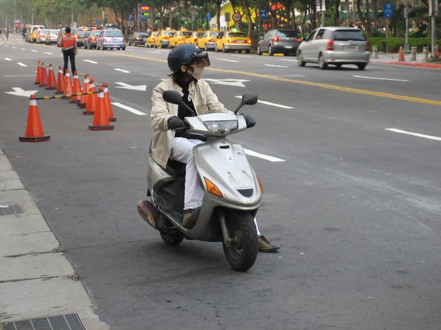 Female on Motorscooter Taipei 057