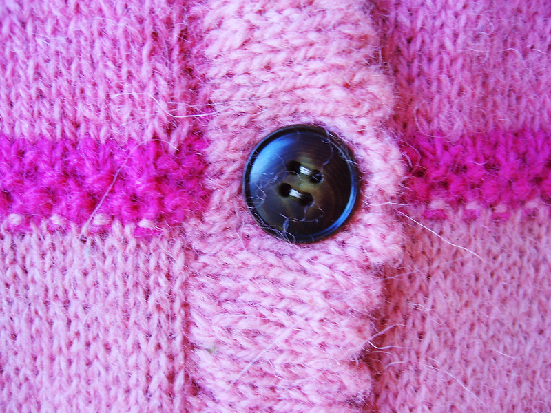 detail - pink cardi button