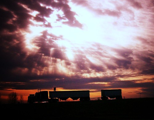 sunset silhouette train truck big grain semi idaho rig peterbilt