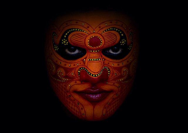 Theyyam dancer's face with make up - India