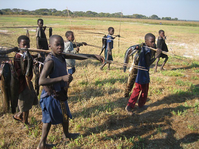 Boys returning from Muteta spear fishing, Munde area
