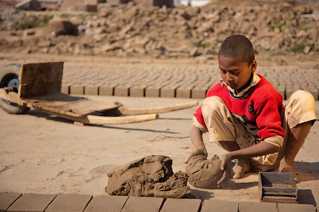 Child laborer making bricks