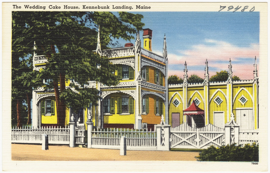 The Wedding Cake House, Kennebunk Landing, Maine: A large ornate, yellow structure with white details. 