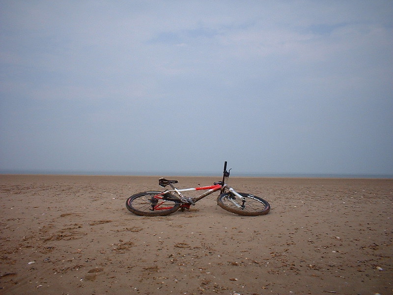 Bike sunbathing on the beach
