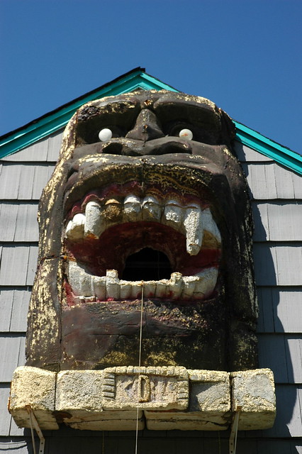 Floss only the teeth you wish to keep, or King Kong Mask as exterior house decor, Ballard, Seattle, Washington, USA