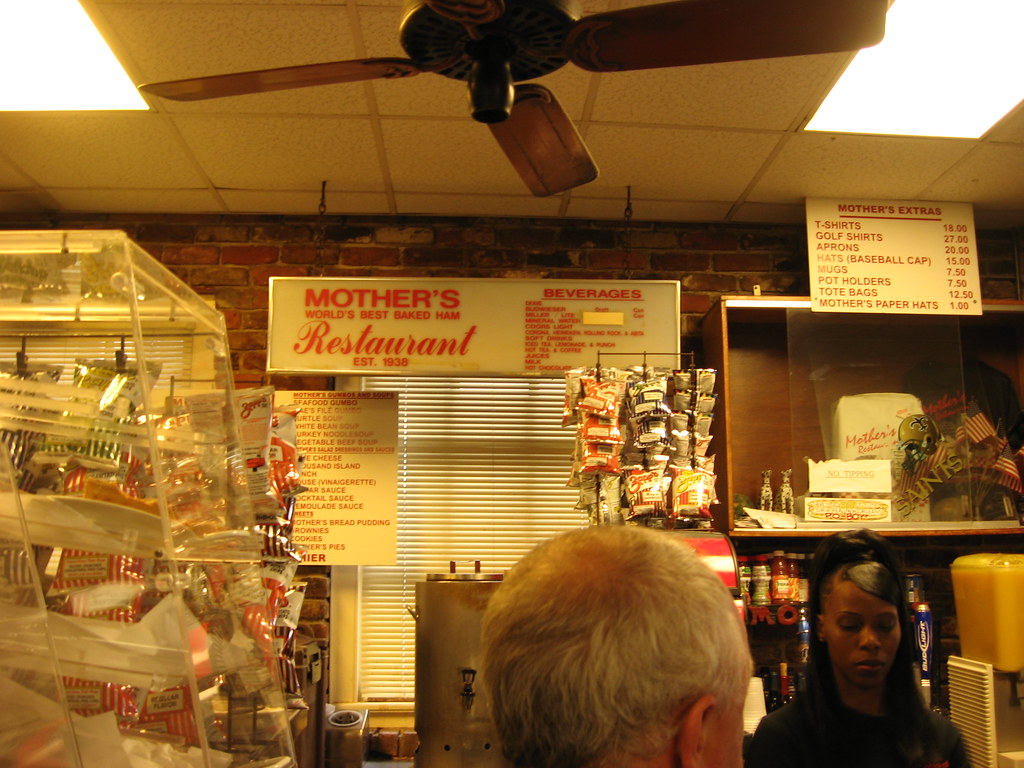 a man in a restaurant - Mother's Restaurant, New Orleans, Louisiana for Some Po'Boys