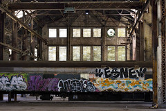 Abandoned warehouse and graffiti covered train
