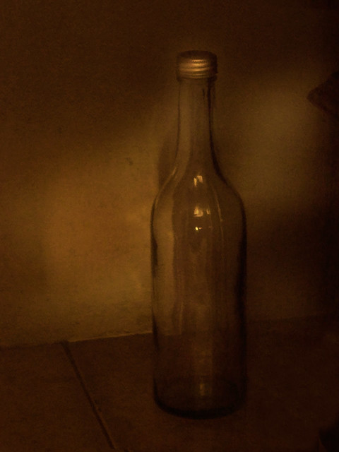 empty bottle in the dark