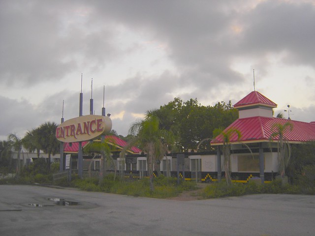 The over grown and abandoned entrance and ticket booths of Miracle Strip Amusement Park, Panama City Beach, Florida
