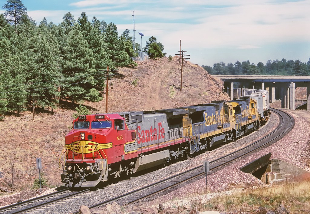 Santa Fe All the Way--General Electric C40-8W 3000 hp diesel electric locomotive number 803 and two GE mates lead a westbound freight train up the Arizona divide at Riordan, west of Flagstaff, summer, 1999.