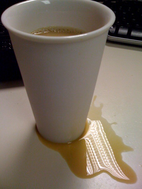 Fake Coffee, Reflection in the spill is a nice touch., Robert Benedict