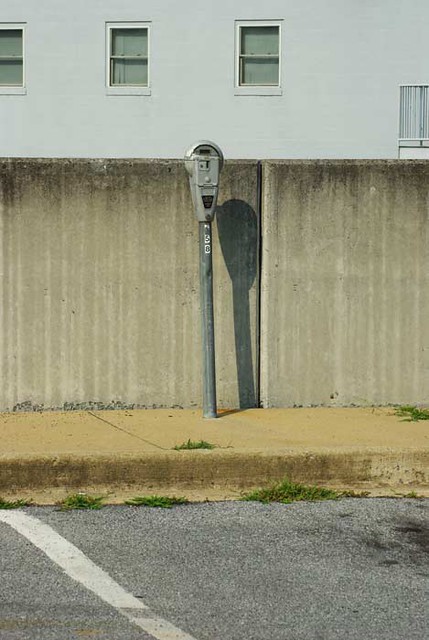 Parking Meter and Cement Wall