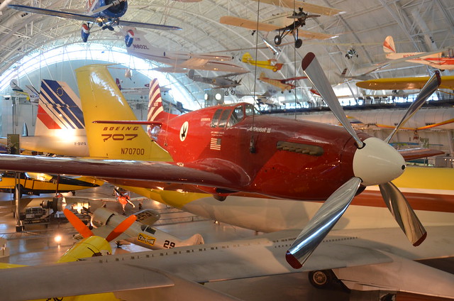 Steven F. Udvar-Hazy Center: North American P-51C, "Excalibur III", with tails of Concorde & Boeing 707 in background