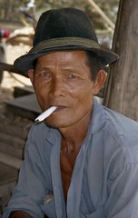 Man with cigarrette; near Hon Chong, Mekong River Delta, Vietnam