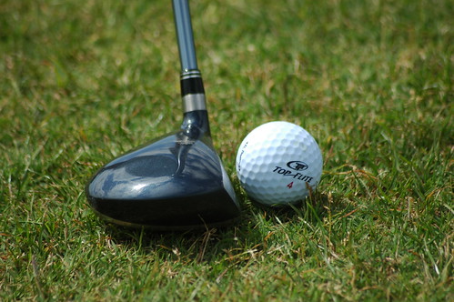 Golf Club Against Ball | Golf club (a driver) positioned to \u2026 | Flickr