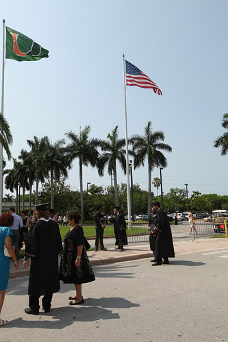 Graduates gathering in front of Bankunited Center