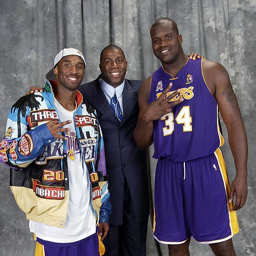Magic Johnson & Kobe Bryant during Bryant's jersey retirement