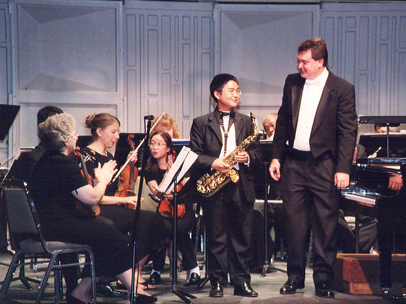 Winner of the 2005 Young Artist's Competition, Doug Chan, stands beside Music Director Dr. Stephen Bednarzyk.

Guam Symphony Society
