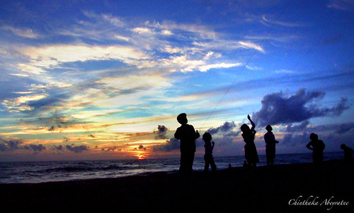 blue girls sunset sea people orange beach boys clouds children surf waves play action indianocean kites srilanka nina tread kalutara chinthaka kalido dilky tharuka
