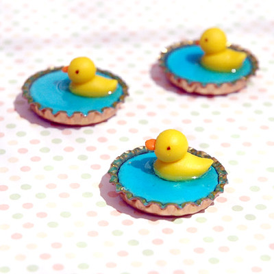 Rubber Ducks | Rubber Ducks swimming on bottlecaps I poured … | Flickr