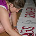 Jessie coloring in a sign late on July 3rd!