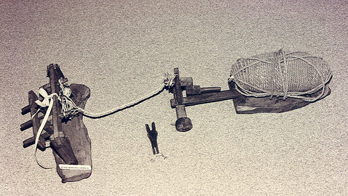 Figure 2. A rope making machine was owned by most families to turn green coconut husk fibers into cordage.

Guam Museum/Lawrence J. Cunningham