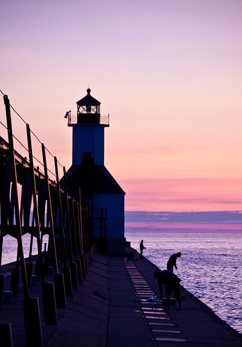 pink sunset sky orange lighthouse lake water mi pier michigan stjoseph lakemichigan