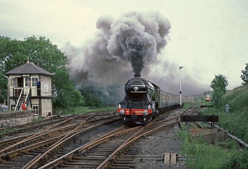 In the 1980s some organisations promoted their own steam charters.This one was organised  in Appleby and ran from there to York.4472 Flying Scotsman passes the then operational box at Horton with the return in fading evening light.
Copyright David Price
No unauthorised use please