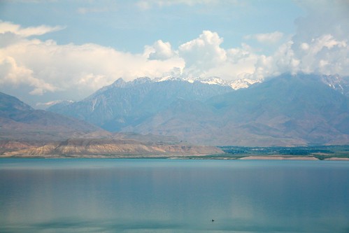 sky lake mountains clouds landscape hills kyrgyzstan