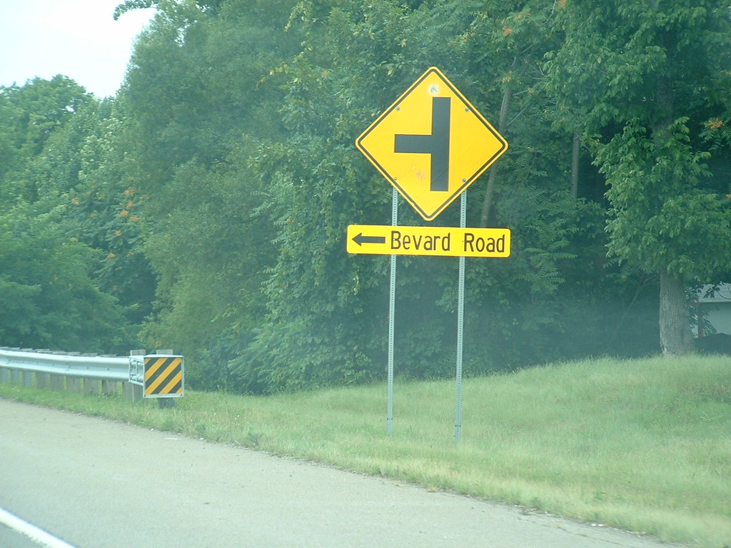 Yellow Road Signs attached to Yellow Diamonds