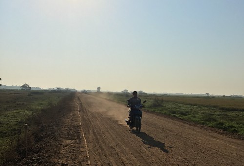 myanmar burma bicycle cycling yangonregion yangon rangoon northerndistrict htantabintownship ahtwinyaekyaw htantabin motorbike dust