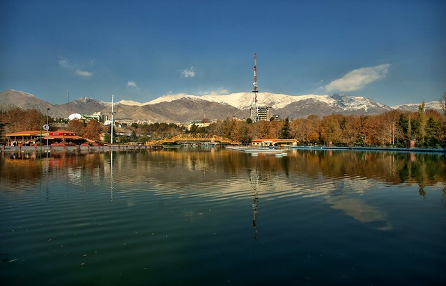 Mellat Park Lake and Snowy Alborz Mountains north of Tehran, Iran (Persia)