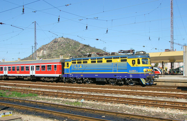Afternoon train from Sofia arriving at Plovdiv, Bulgaria, led by Skoda-built Bo-Bo electric locomotive 44 002 (rebuilt and modernized by Koncar in Zagreb, Croatia), Bulgaria State Railways (BDZ), April 1, 2006