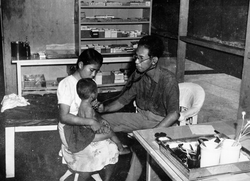 Dr. Ramon Sablan at work in the dispensary.

Micronesian Area Research Center (MARC)/Anne Hattori