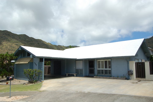 House showing second day after roof coating application