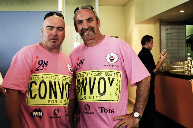 Mick and 'Fish' embracing the pink T-shirts at the Windang fun day to raise money for Camp Quality Convoy for Kids