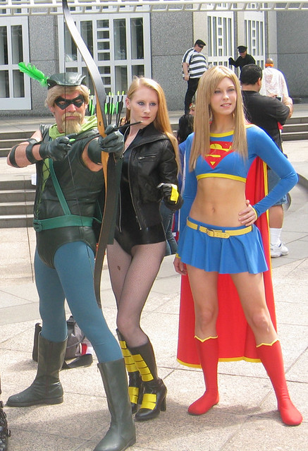 Dani as the Black Canary, with the Green Arrow and Supergirl